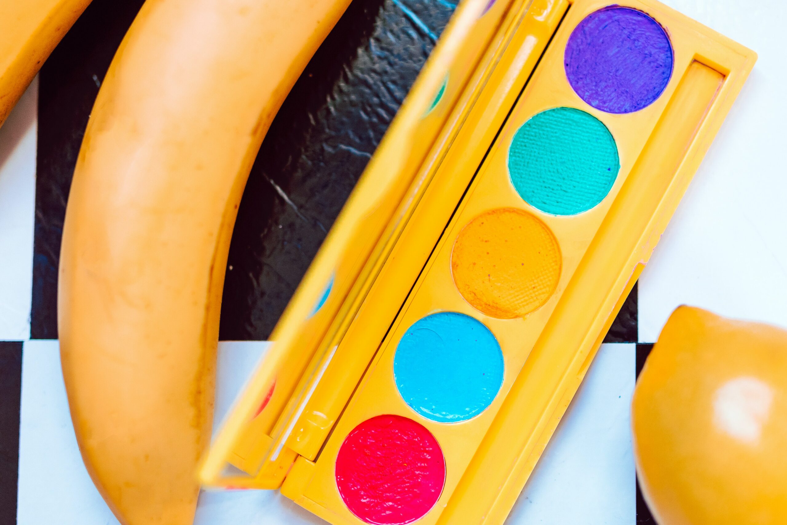 bright colored palette and a banana